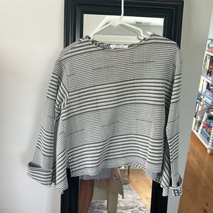 Very cute Derek Lam 10 Crosby long sleeve black and white top with flair!